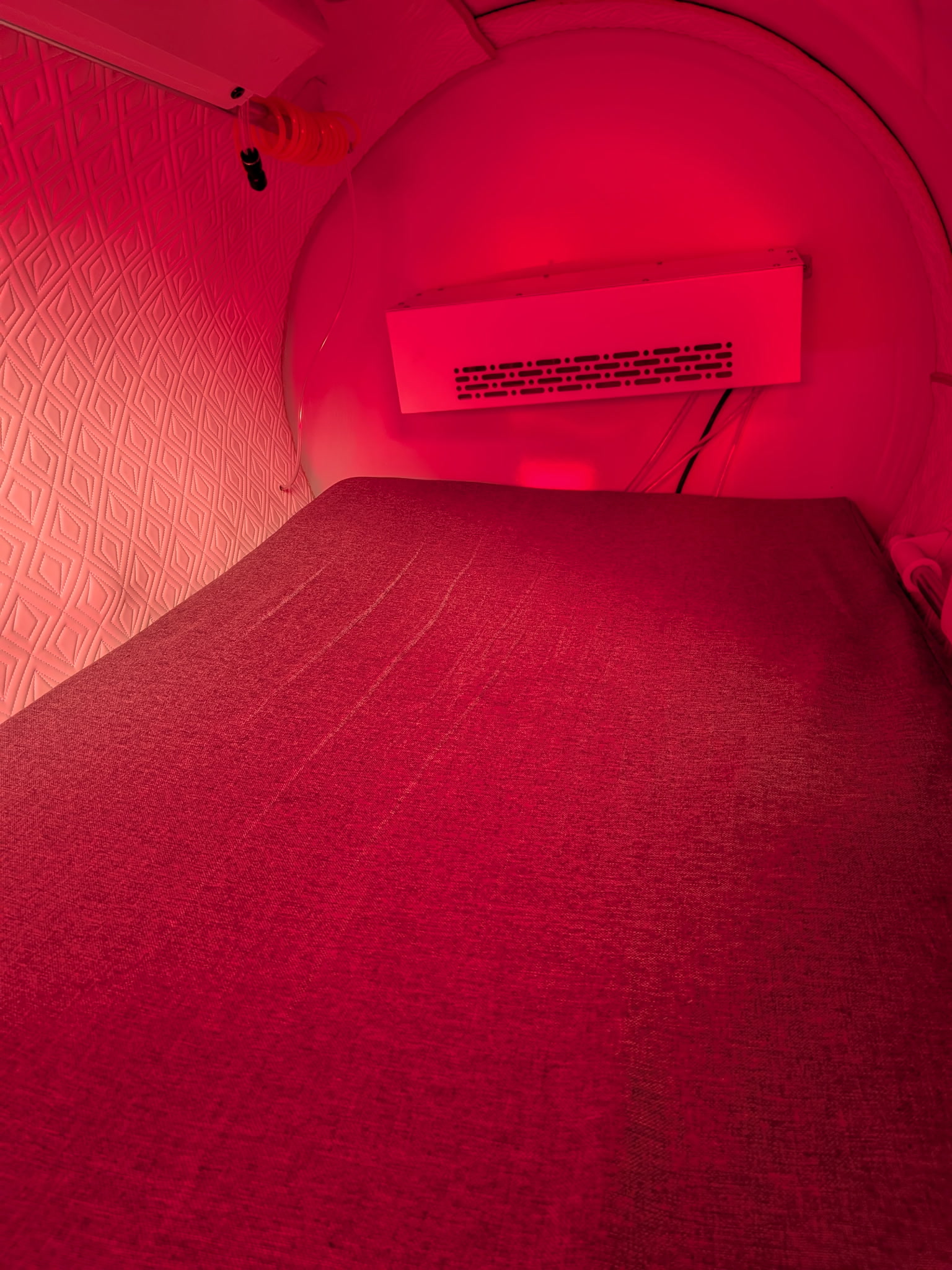 A Hardshell Chamber and Red Light, Arranged for a Private Wellness Room